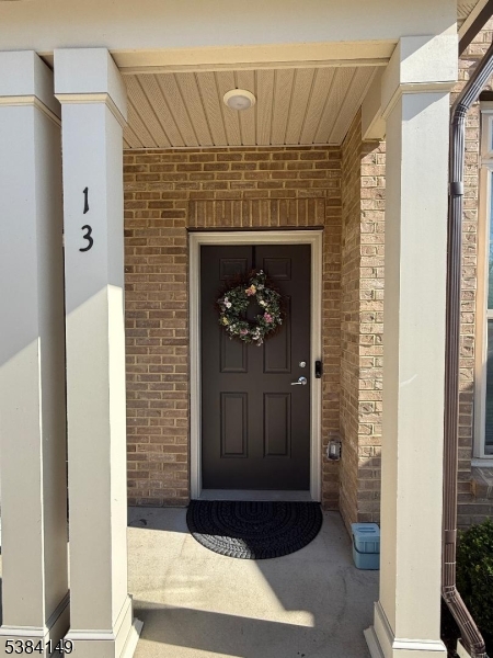 13 Sternadori Road Somerville, NJ 08876 - Photo 13 of 18 a view of an entryway with a fireplace