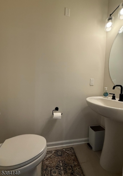 13 Sternadori Road Somerville, NJ 08876 - Photo 14 of 18 a bathroom with a toilet and a sink