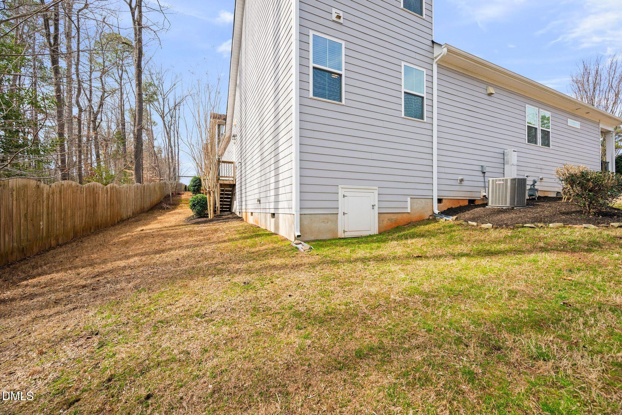 528 Spring Flower Court Cary, NC 27511 - Photo 45 of 51 a view of a house with backyard and sitting area