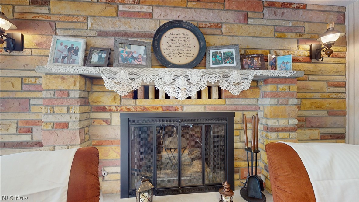 976 Braun Road Belpre, OH 45714 - Photo 17 of 48 FIREPLACE IN DINING AREA