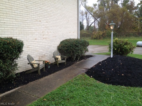 8819 Diagonal Road Streetsboro, OH 44241 - Photo 7 of 23 Front walkway in the fall. Let's go inside through the front door.