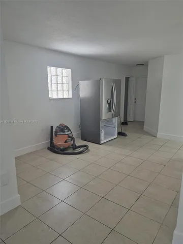 a view of a livingroom and entryway