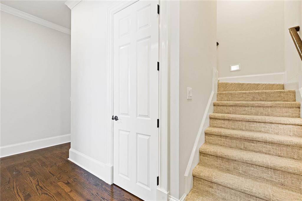 2010 Legends Way Braselton, GA 30517 - Photo 23 of 77 a view of an entryway with wooden floor