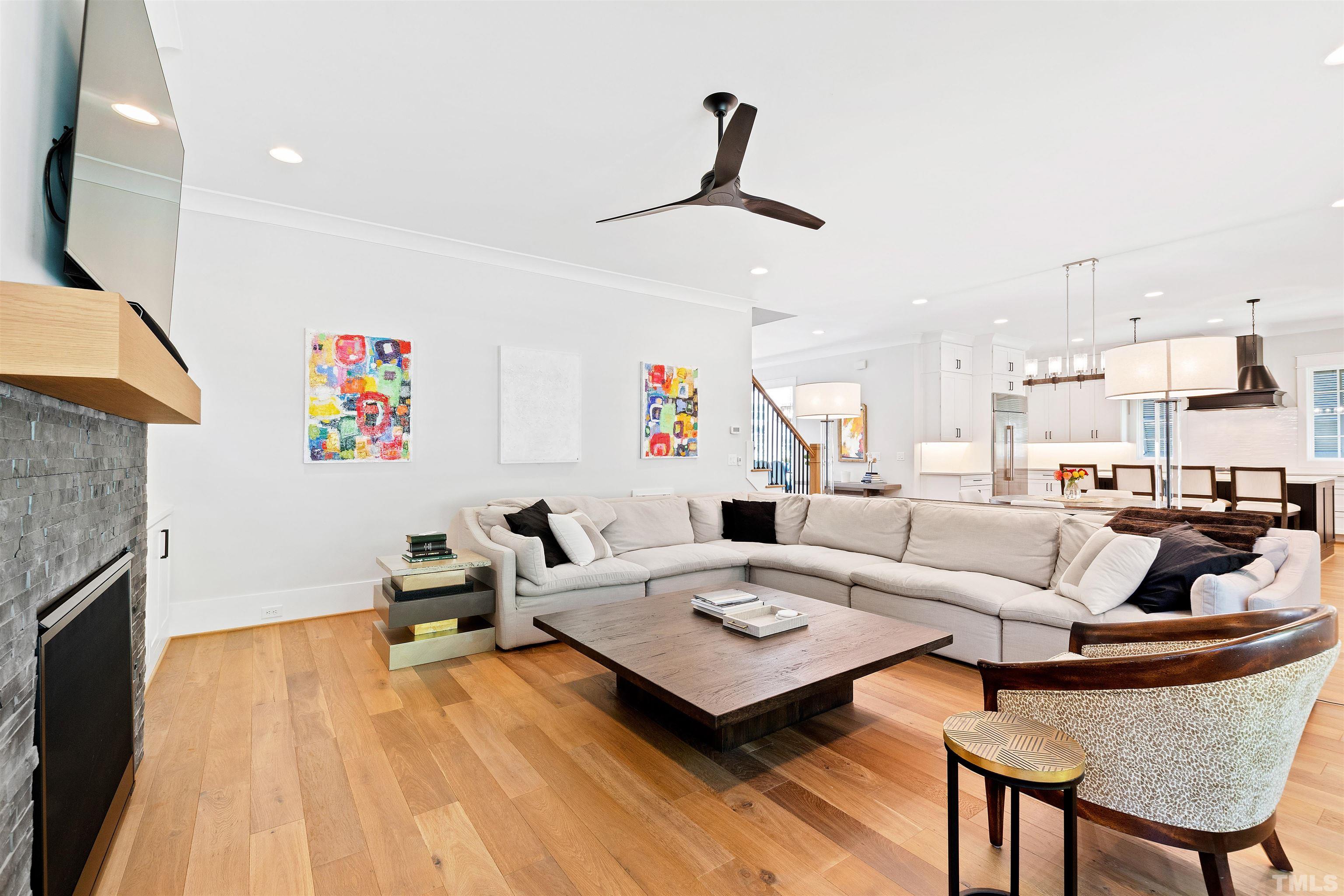 3512 Catalano Drive Raleigh, NC 27607 - Photo 20 of 64 a living room with furniture and a fireplace