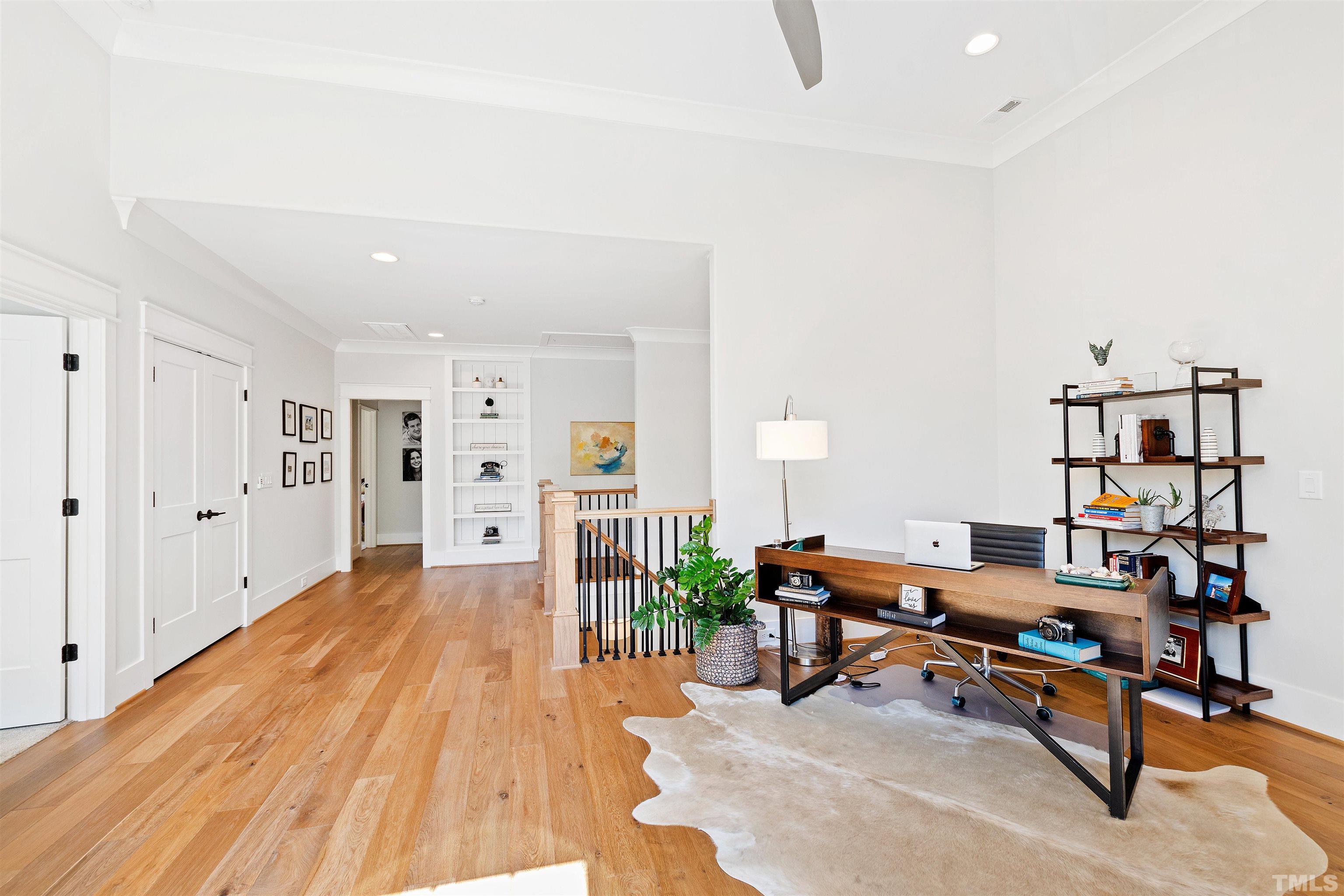 3512 Catalano Drive Raleigh, NC 27607 - Photo 29 of 64 a workspace with furniture and wooden floor