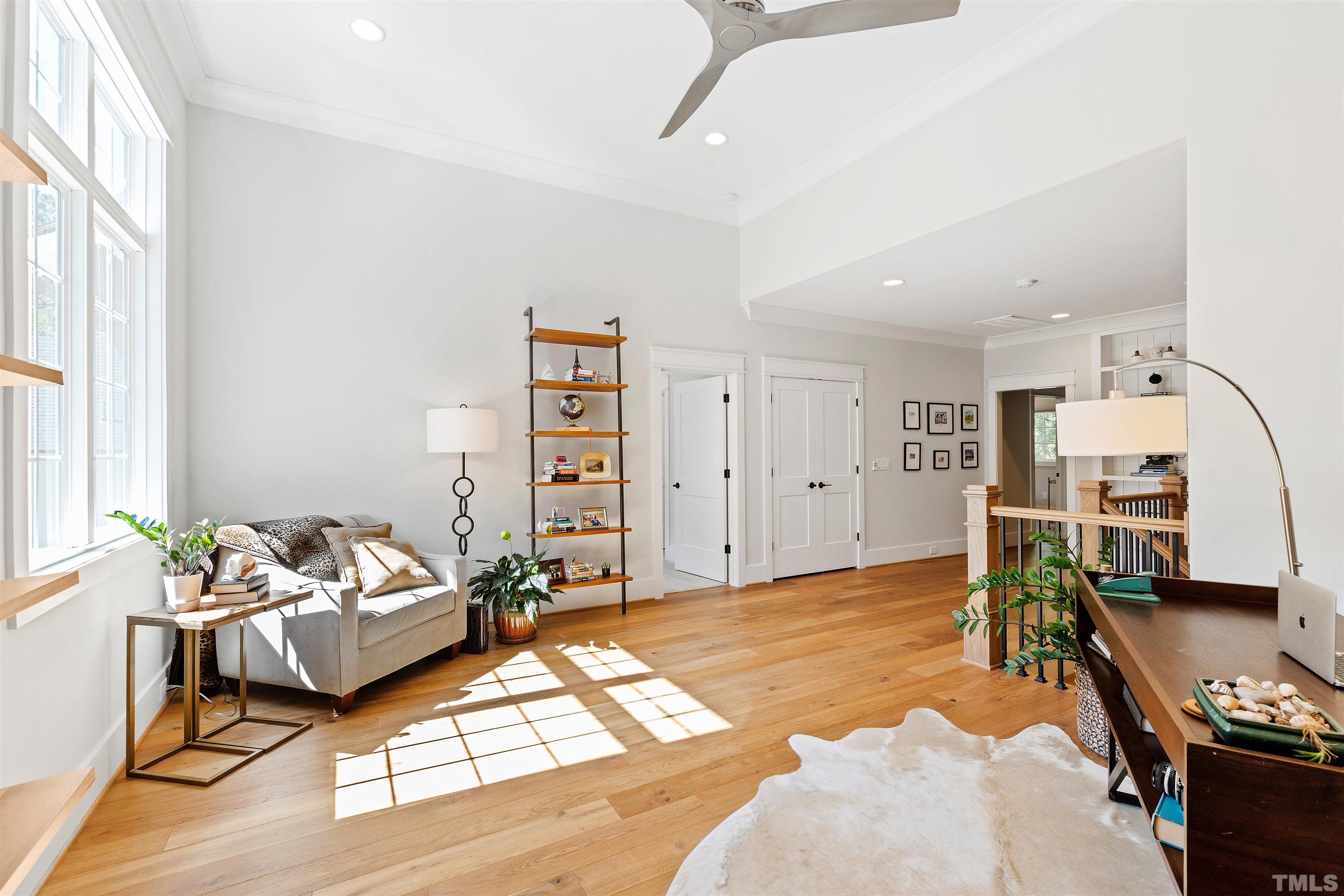 3512 Catalano Drive Raleigh, NC 27607 - Photo 30 of 64 a living room with furniture and a flat screen tv