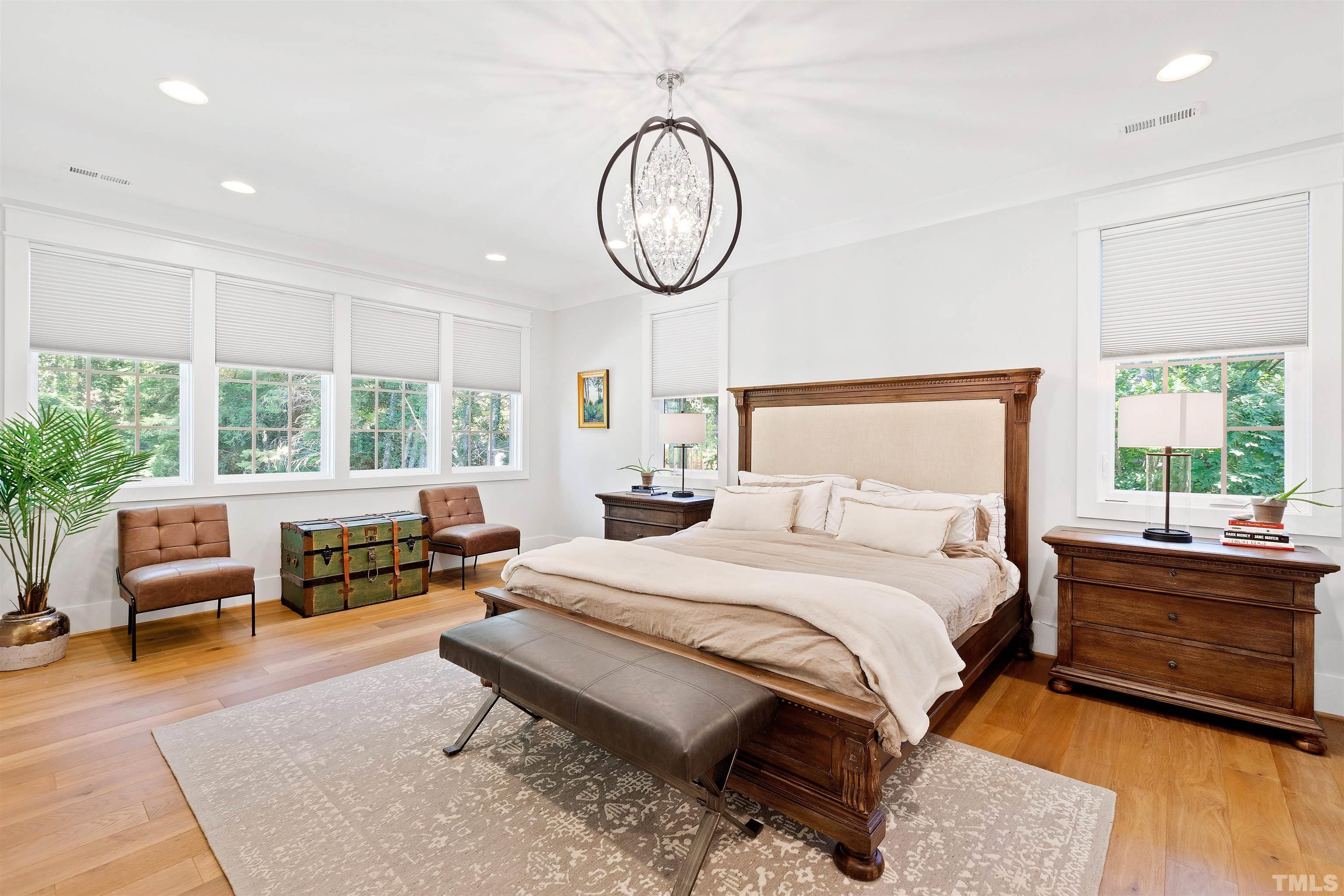 3512 Catalano Drive Raleigh, NC 27607 - Photo 34 of 64 a bedroom with bed and a large window