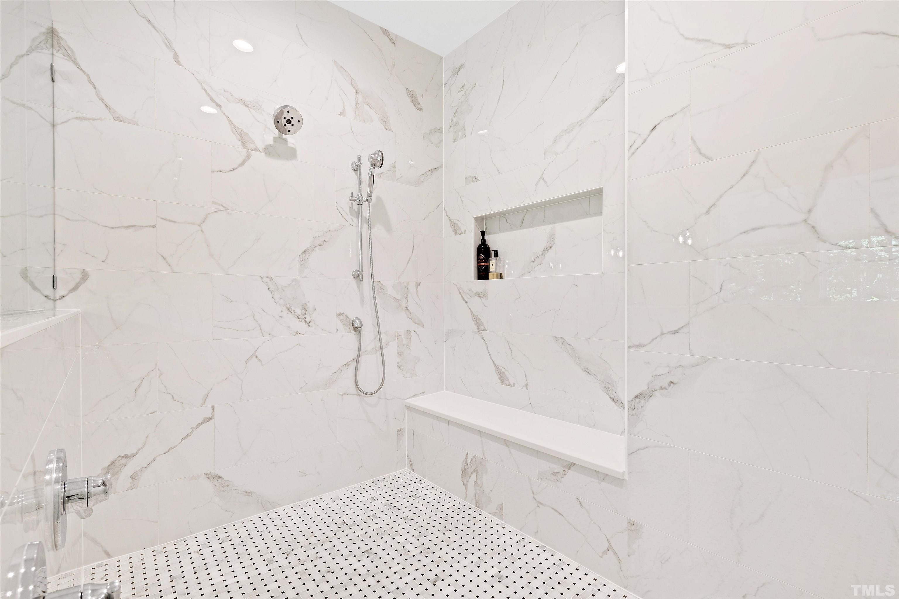3512 Catalano Drive Raleigh, NC 27607 - Photo 40 of 64 a bathroom with a bathtub and a shower