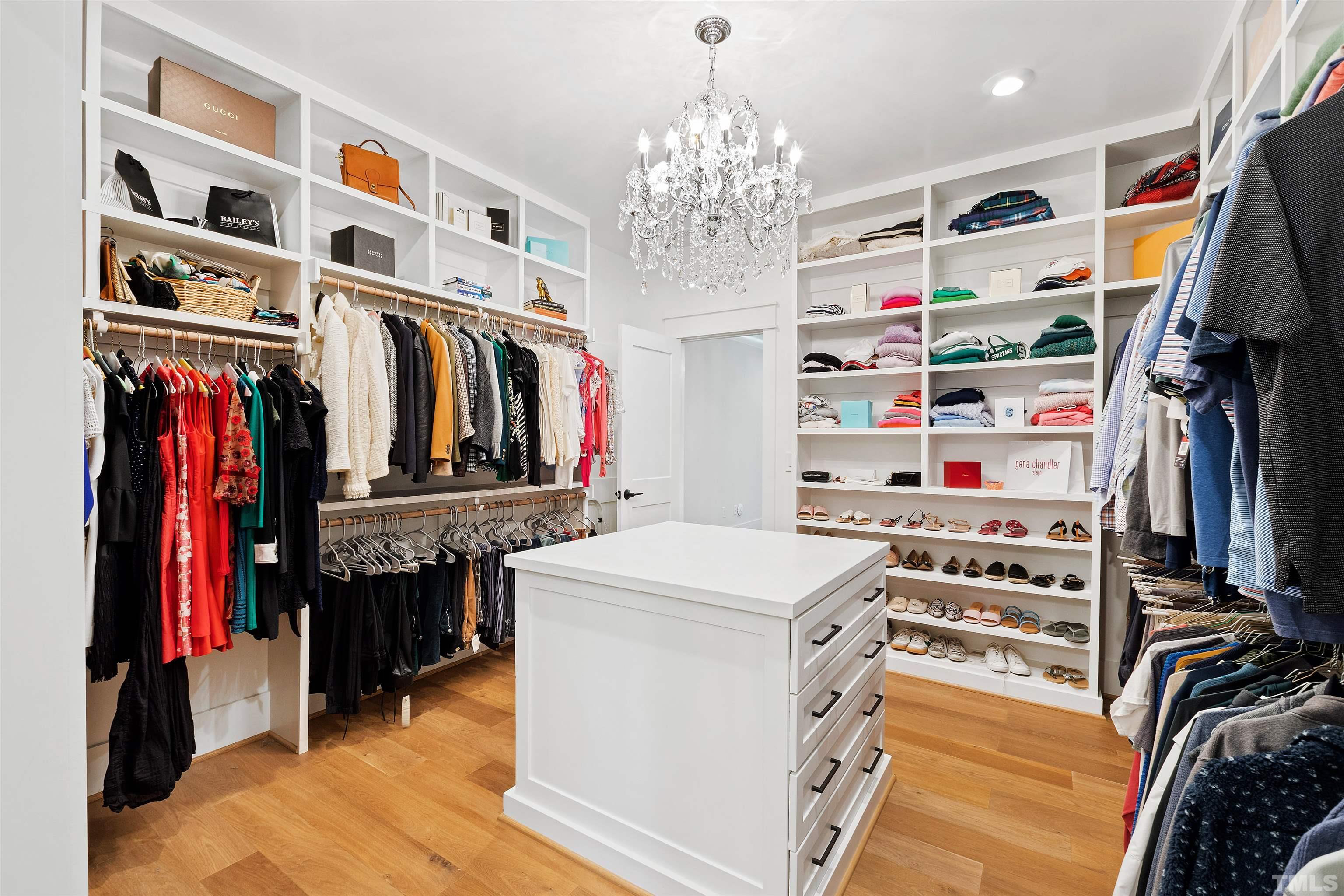 3512 Catalano Drive Raleigh, NC 27607 - Photo 43 of 64 a view of walk in closet with clothes and shoes