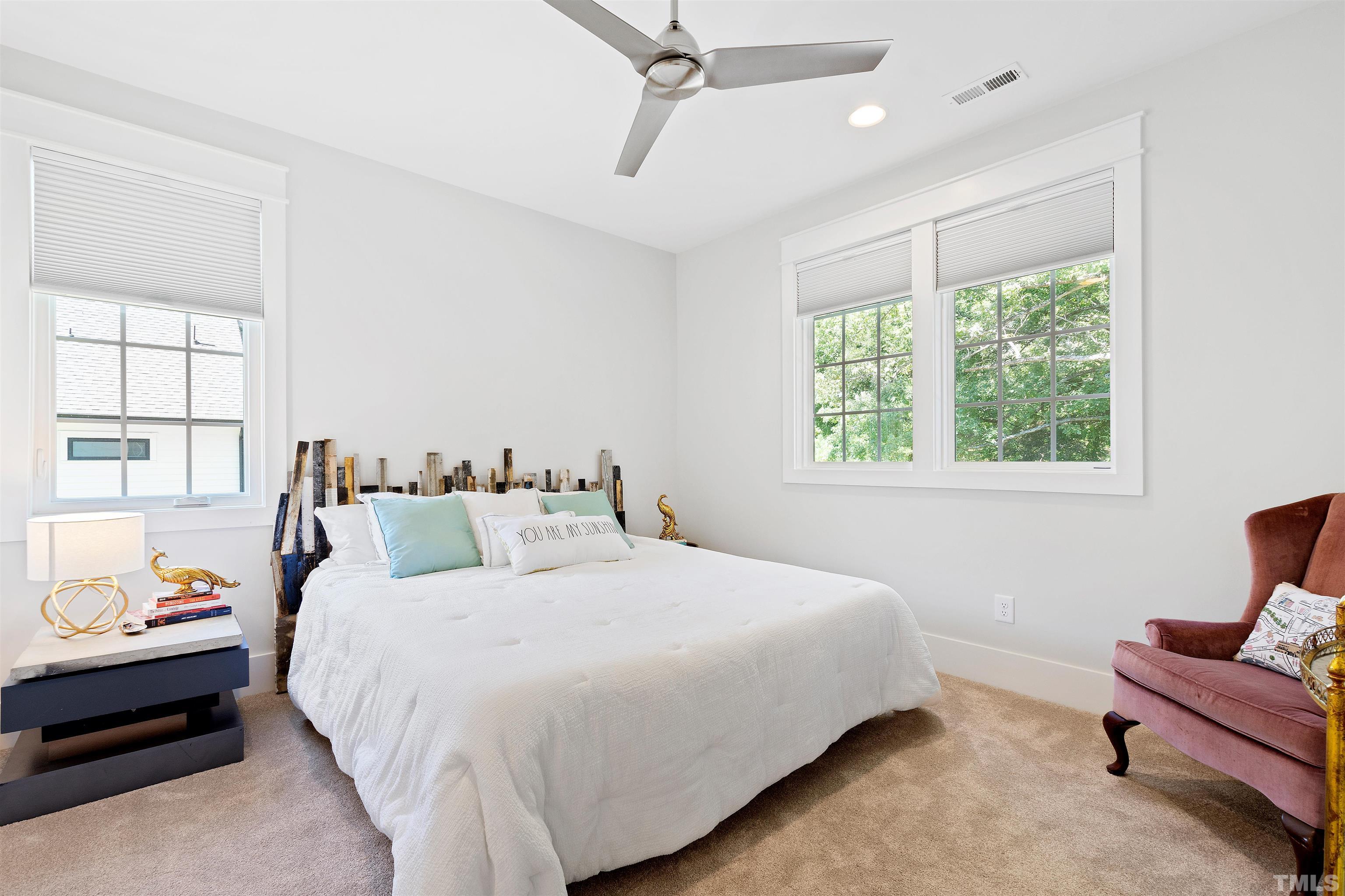 3512 Catalano Drive Raleigh, NC 27607 - Photo 48 of 64 a bedroom with a bed couch and window