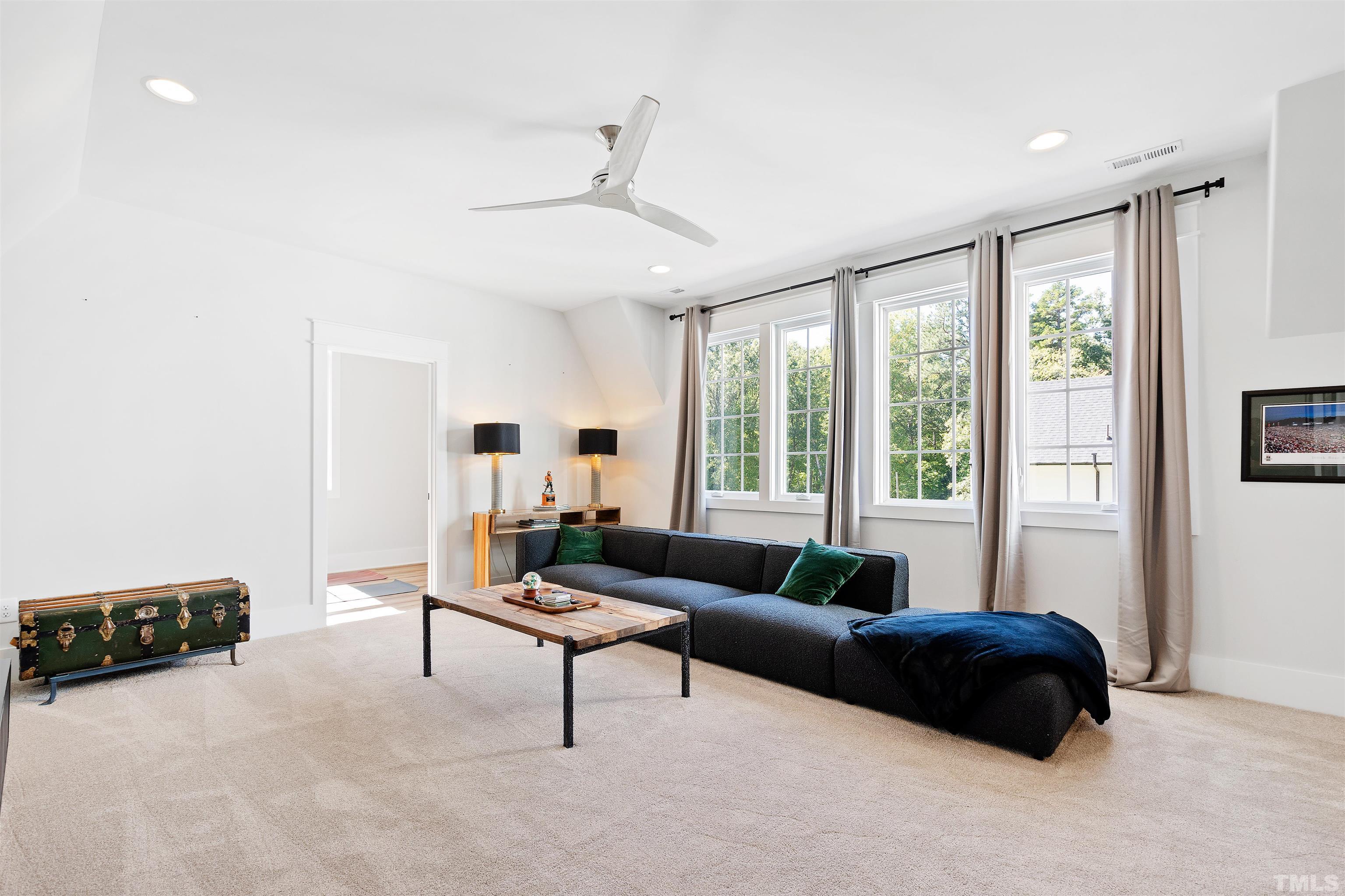 3512 Catalano Drive Raleigh, NC 27607 - Photo 53 of 64 a living room with furniture and a large window