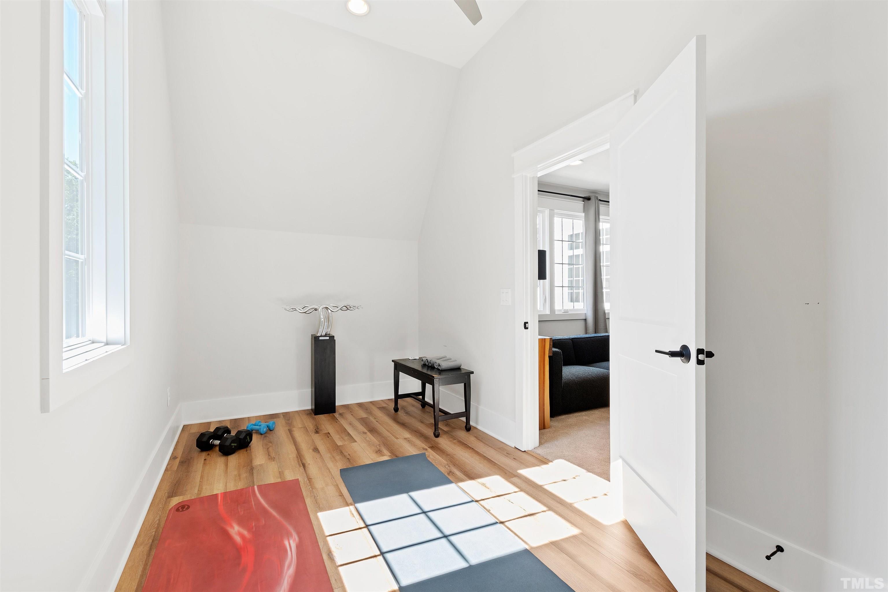 3512 Catalano Drive Raleigh, NC 27607 - Photo 55 of 64 a bedroom with a bed and a walk in closet