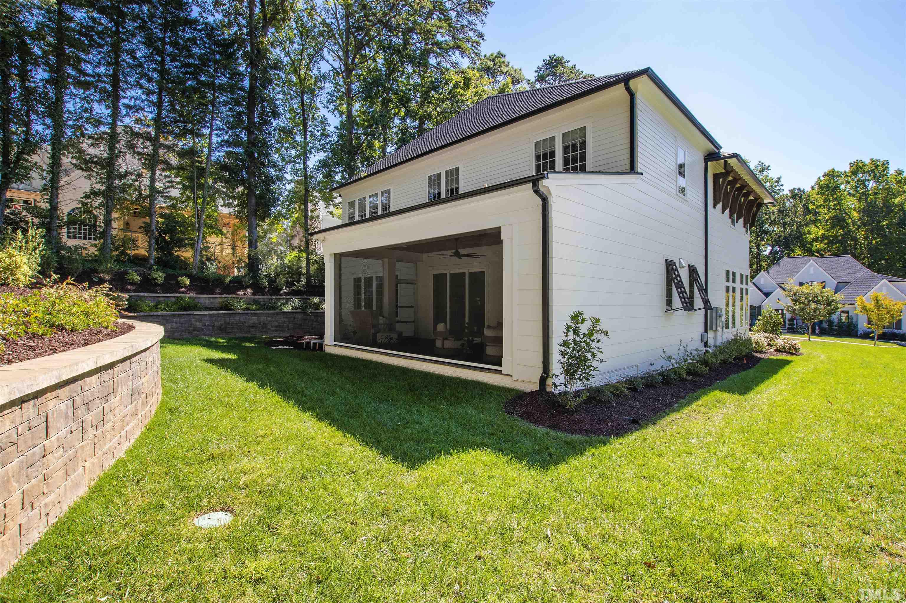 3512 Catalano Drive Raleigh, NC 27607 - Photo 61 of 64 a view of a house with a yard