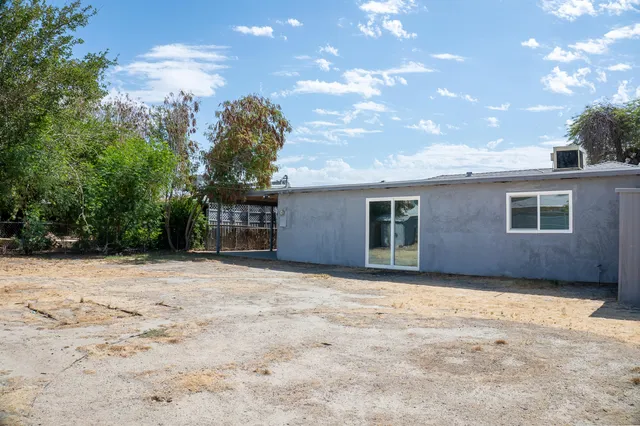 a house view with a outdoor space