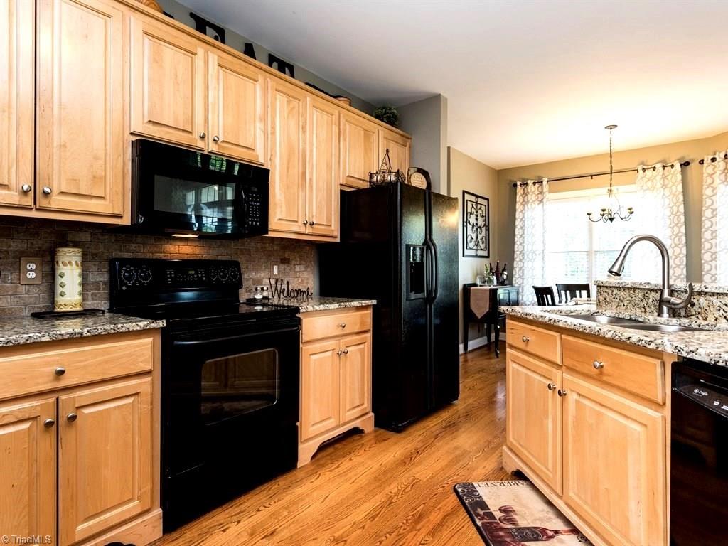 4202 Burch Bridge Road Burlington, NC 27217 - Photo 5 of 24 Nice Tile Backsplash and Hardwoods
