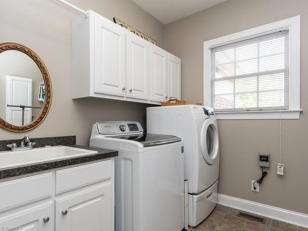 4202 Burch Bridge Road Burlington, NC 27217 - Photo 8 of 24 Spacious Laundry w/Sink & Cabinets