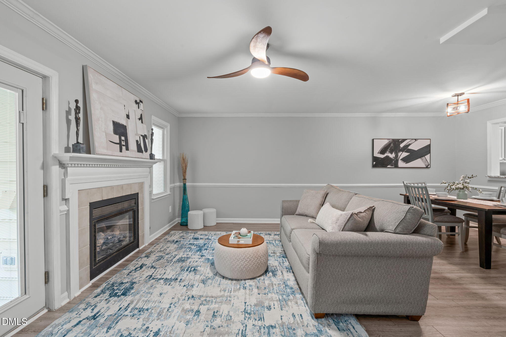 203 Oak Hollow Court Raleigh, NC 27613 - Photo 15 of 37 a living room with furniture and a fireplace