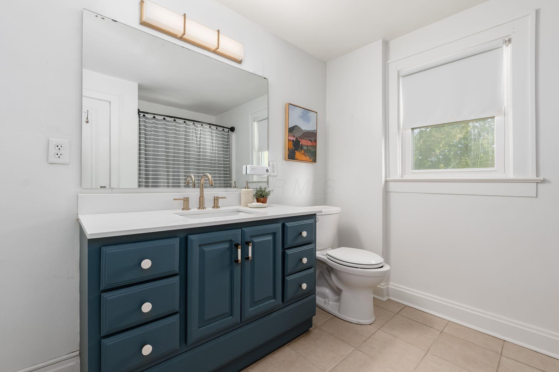 458 Crestview Road Columbus, OH 43202 - Photo 31 of 41 Updated full bathroom with tub/shower, large vanity and sleek finishes