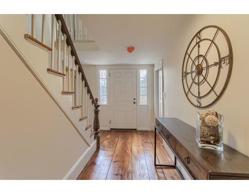 446 Liberty Square Road Boxborough, MA 01719 - Photo 3 of 29 a view of a livingroom with furniture and hardwood floor