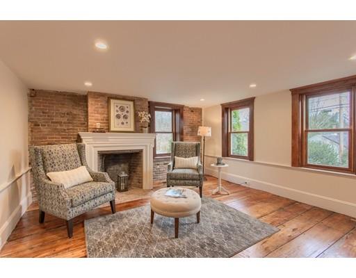 446 Liberty Square Road Boxborough, MA 01719 - Photo 6 of 29 a living room with furniture a window and a fireplace