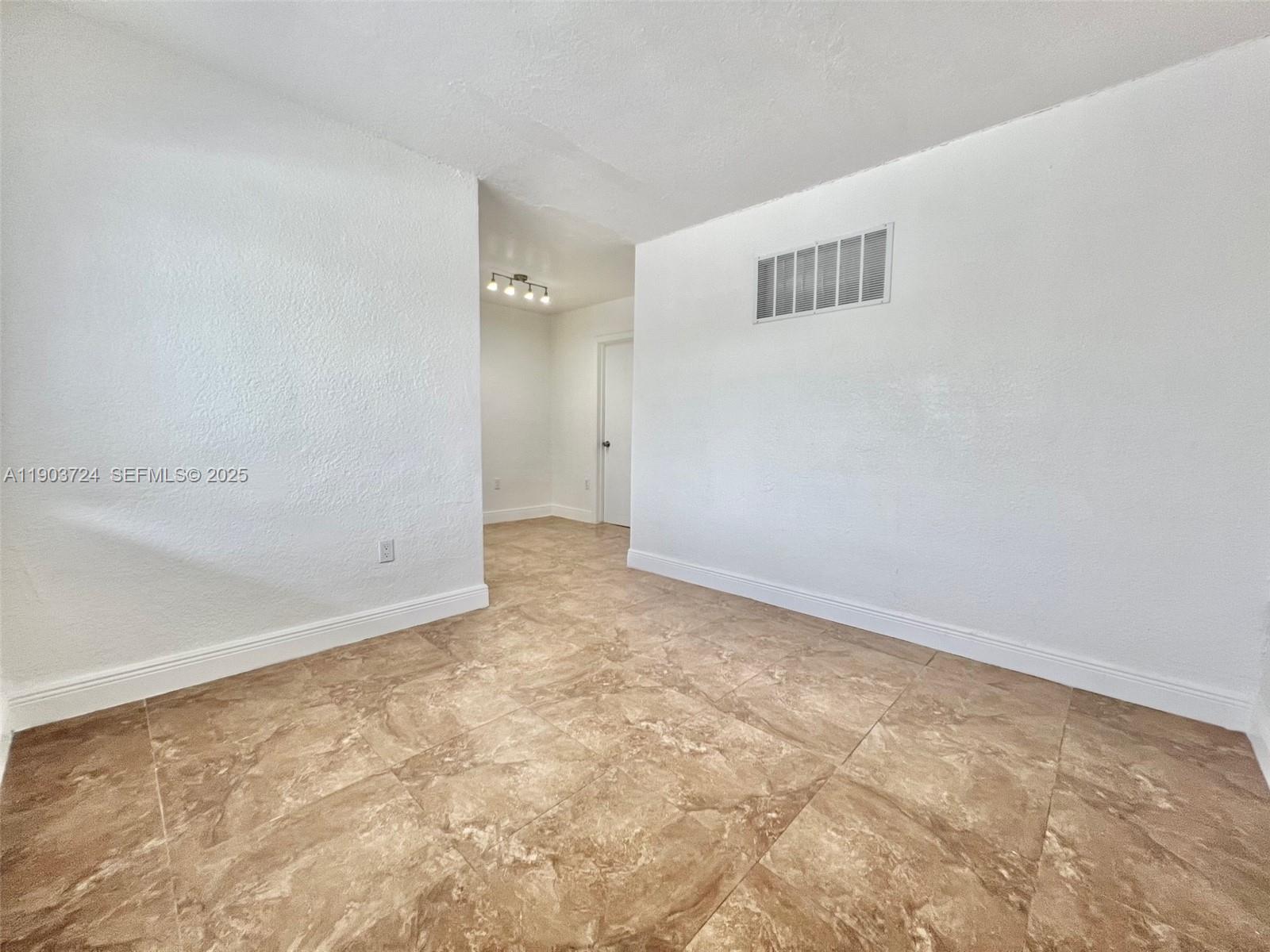 10 Northwest 77th Street, Unit 10 Miami, FL 33150 - Photo 11 of 12 wooden floor in a room