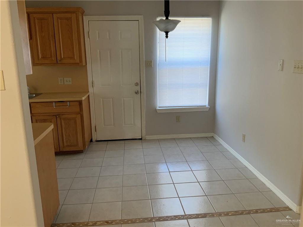808 West Bronze Avenue, Unit B Pharr, TX 78577 - Photo 2 of 20 an empty room with windows