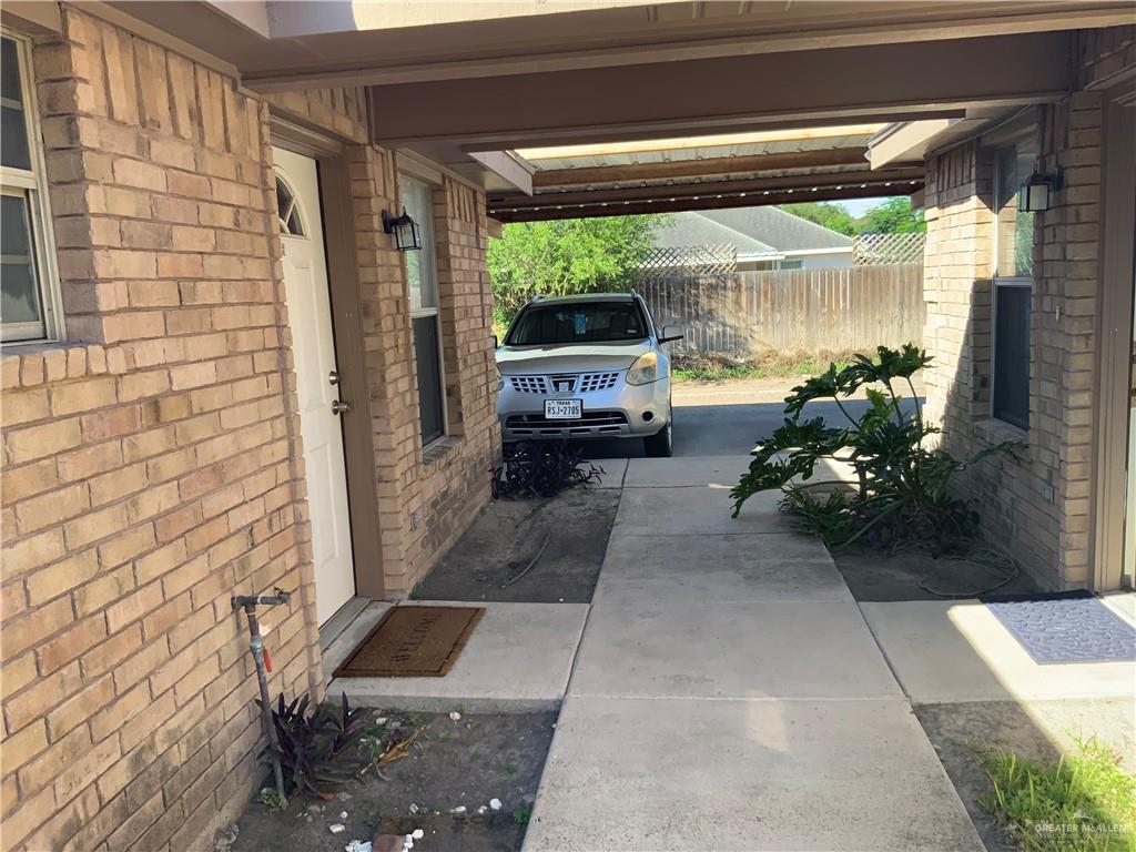 808 West Bronze Avenue, Unit B Pharr, TX 78577 - Photo 4 of 20 a view of a porch with dining table and chairs