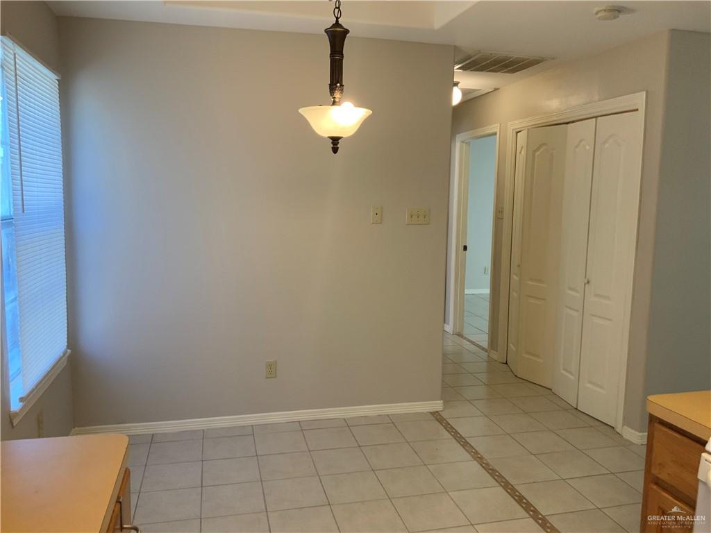 808 West Bronze Avenue, Unit B Pharr, TX 78577 - Photo 5 of 20 a view of a bathroom with a shower and vanity