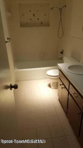 a view of a room that has a window in it