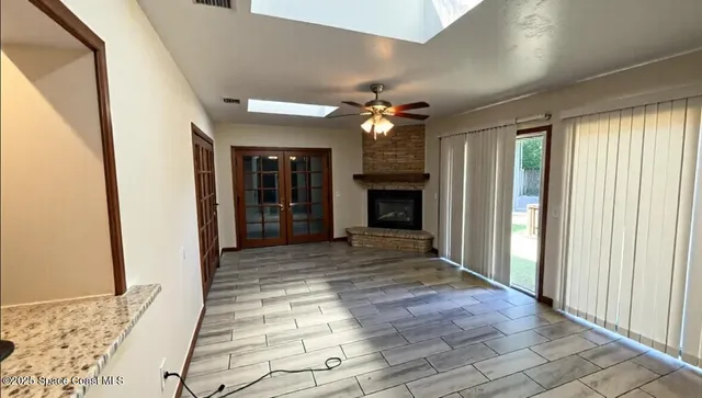 a bedroom with bed and window