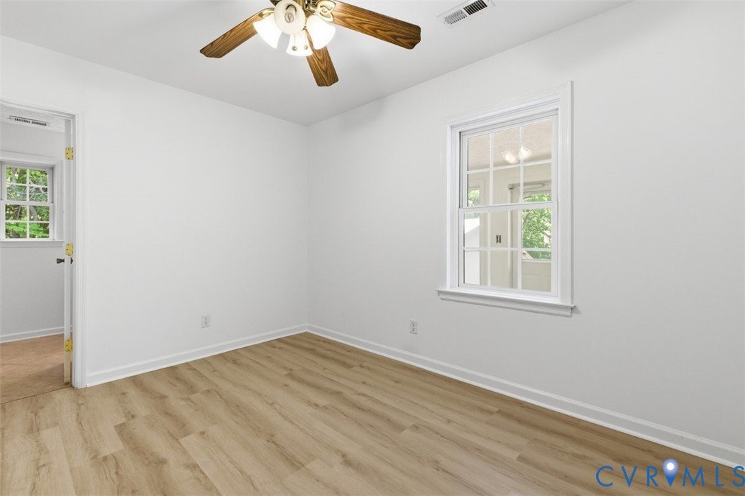 18501 Branders Bridge Road Colonial Heights, VA 23834 - Photo 21 of 43 an empty room with a window