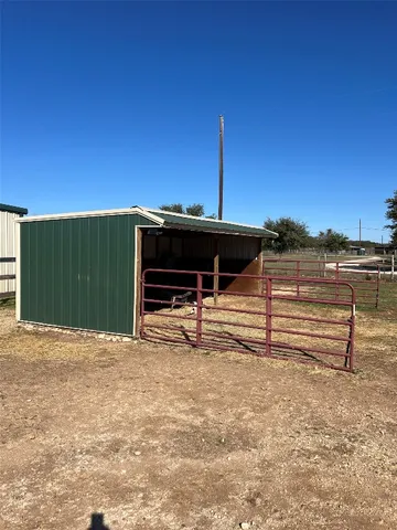 a view of a yard with an outdoor space