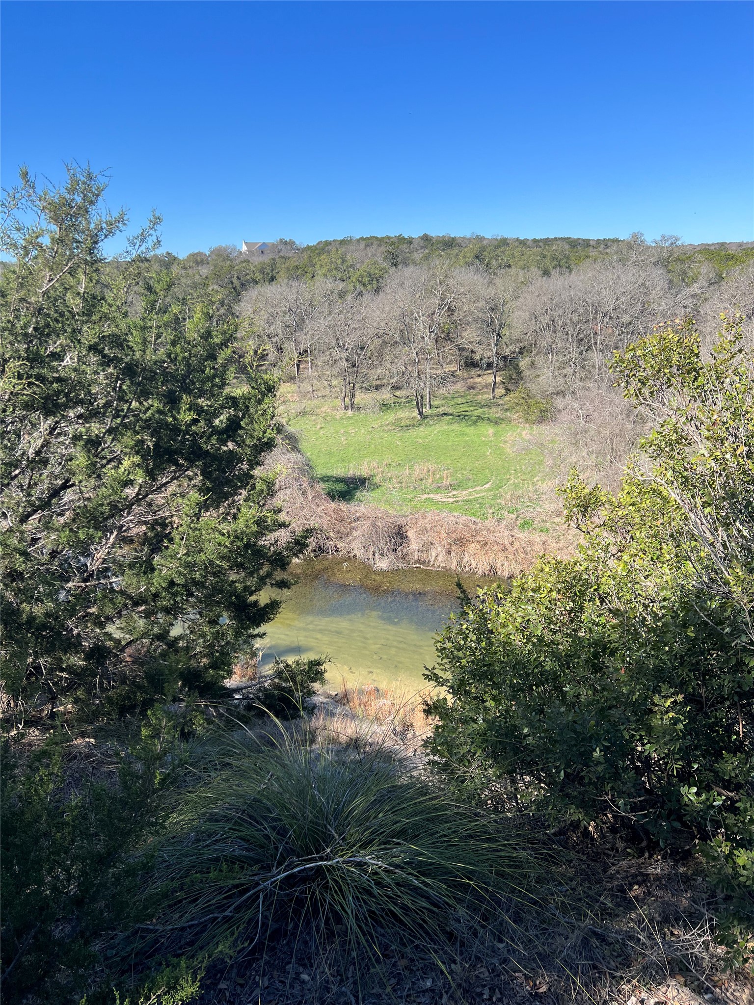 555 River Run Leander, TX 78641 - Photo 19 of 32 a view of an ocean and a mountain