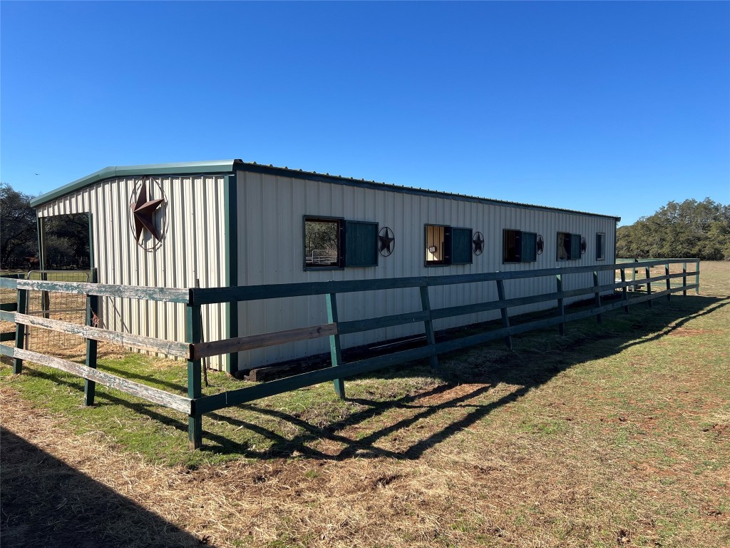 555 River Run Leander, TX 78641 - Photo 25 of 32 a view of a house with wooden fence