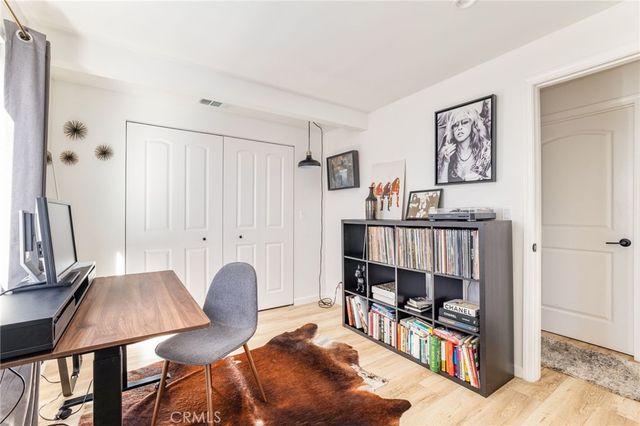 a bedroom with a bed and furniture