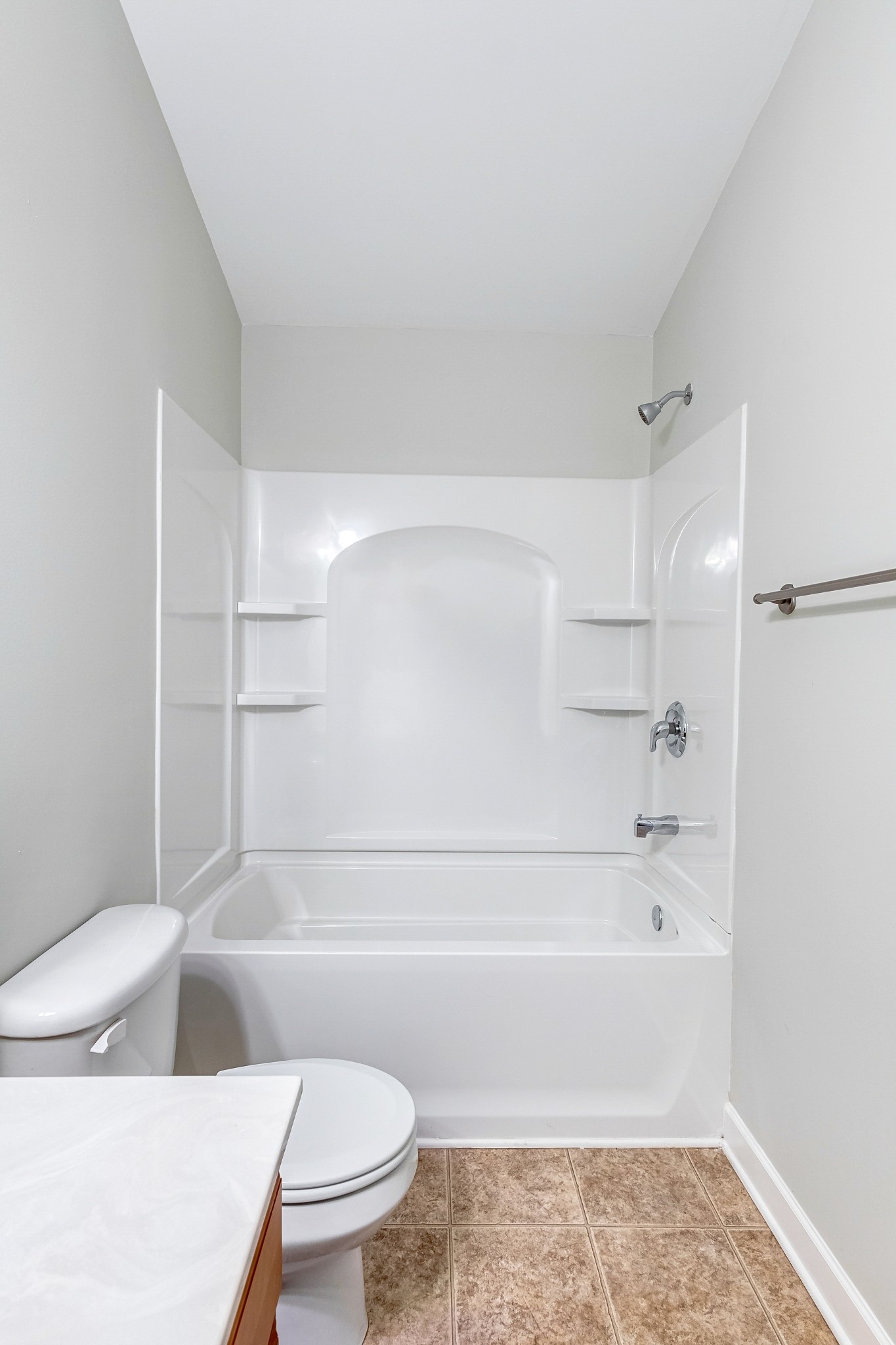 5441 Perlou Lane Murfreesboro, TN 37128 - Photo 30 of 35 a bathroom with a toilet and a bathtub
