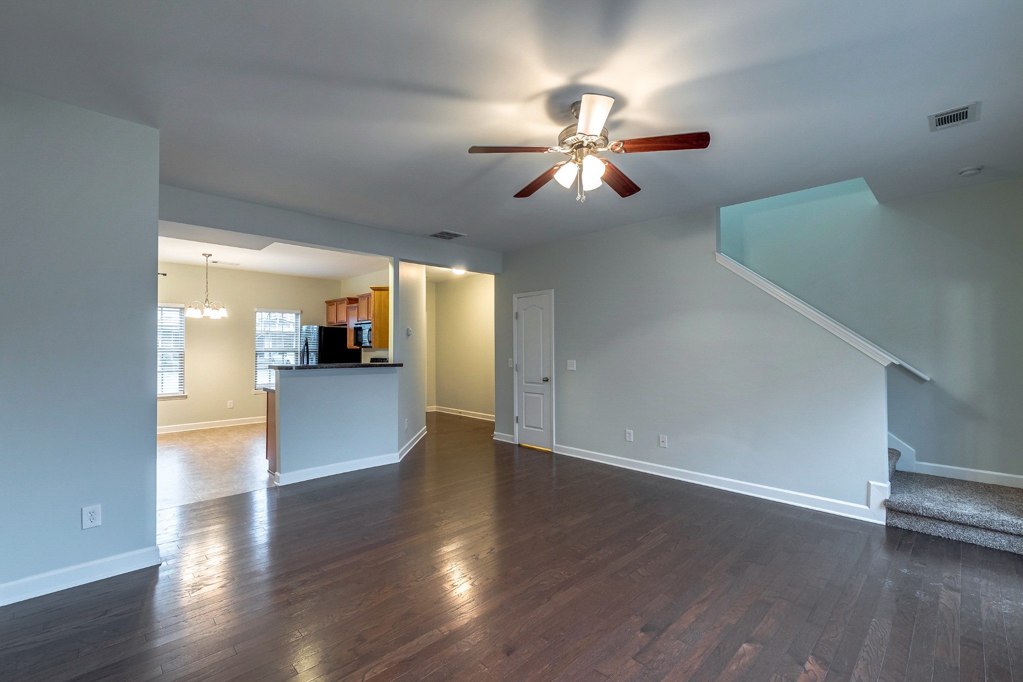 5441 Perlou Lane Murfreesboro, TN 37128 - Photo 7 of 35 a view of empty room with wooden floor and fan