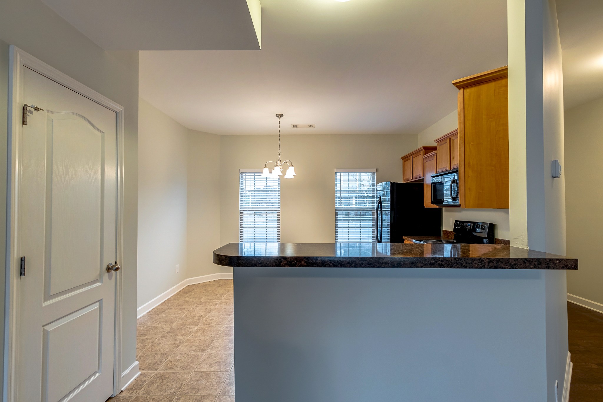 5441 Perlou Lane Murfreesboro, TN 37128 - Photo 10 of 35 a kitchen with a refrigerator and a sink