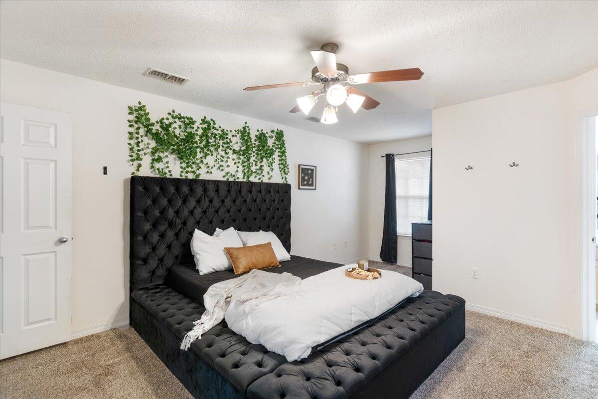 210 Citadel Lane Crestview, FL 32539 - Photo 19 of 38 a bedroom with bed and window