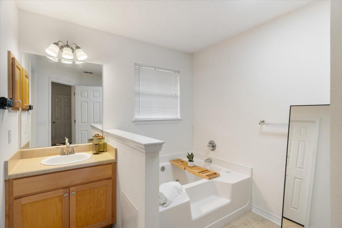 210 Citadel Lane Crestview, FL 32539 - Photo 21 of 38 a bathroom with a sink and a mirror