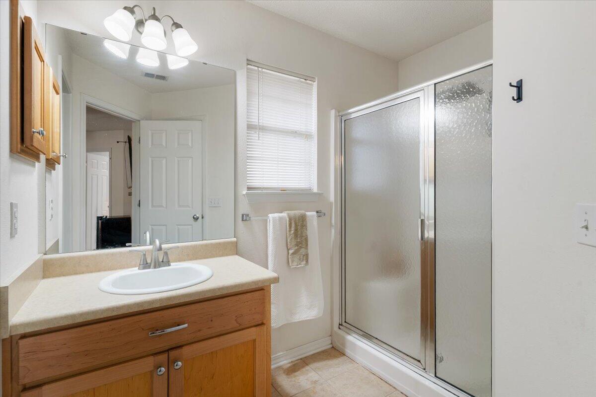 210 Citadel Lane Crestview, FL 32539 - Photo 22 of 38 a bathroom with a sink and a mirror