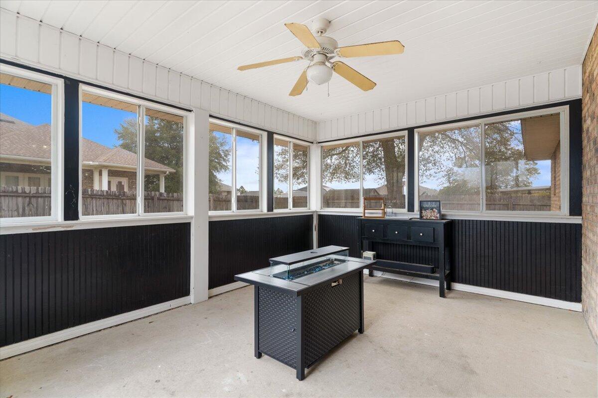 210 Citadel Lane Crestview, FL 32539 - Photo 33 of 38 a living room with furniture and a large window
