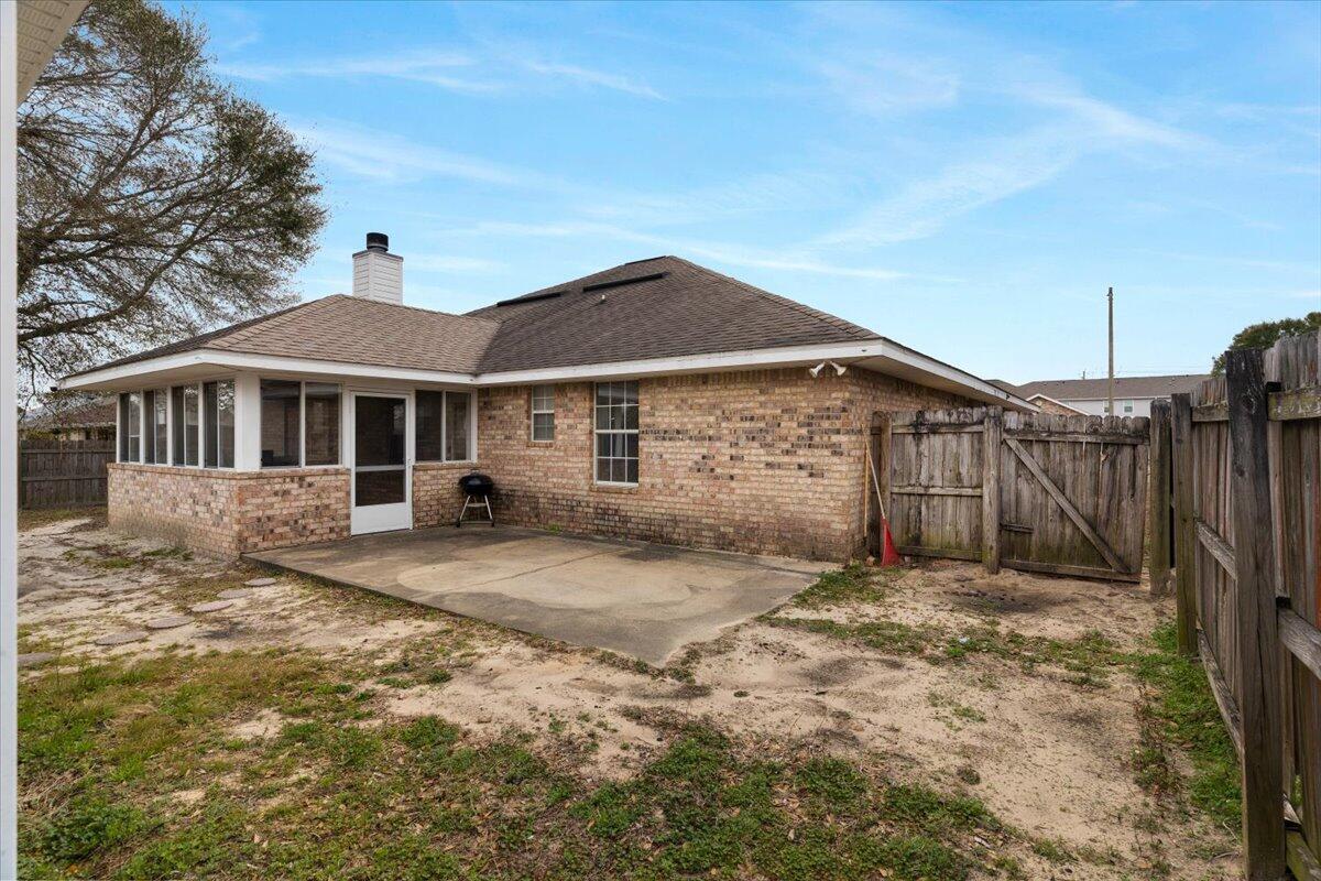 210 Citadel Lane Crestview, FL 32539 - Photo 36 of 38 a front view of a house with a yard