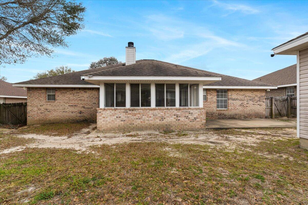 210 Citadel Lane Crestview, FL 32539 - Photo 37 of 38 a front view of a house with a yard