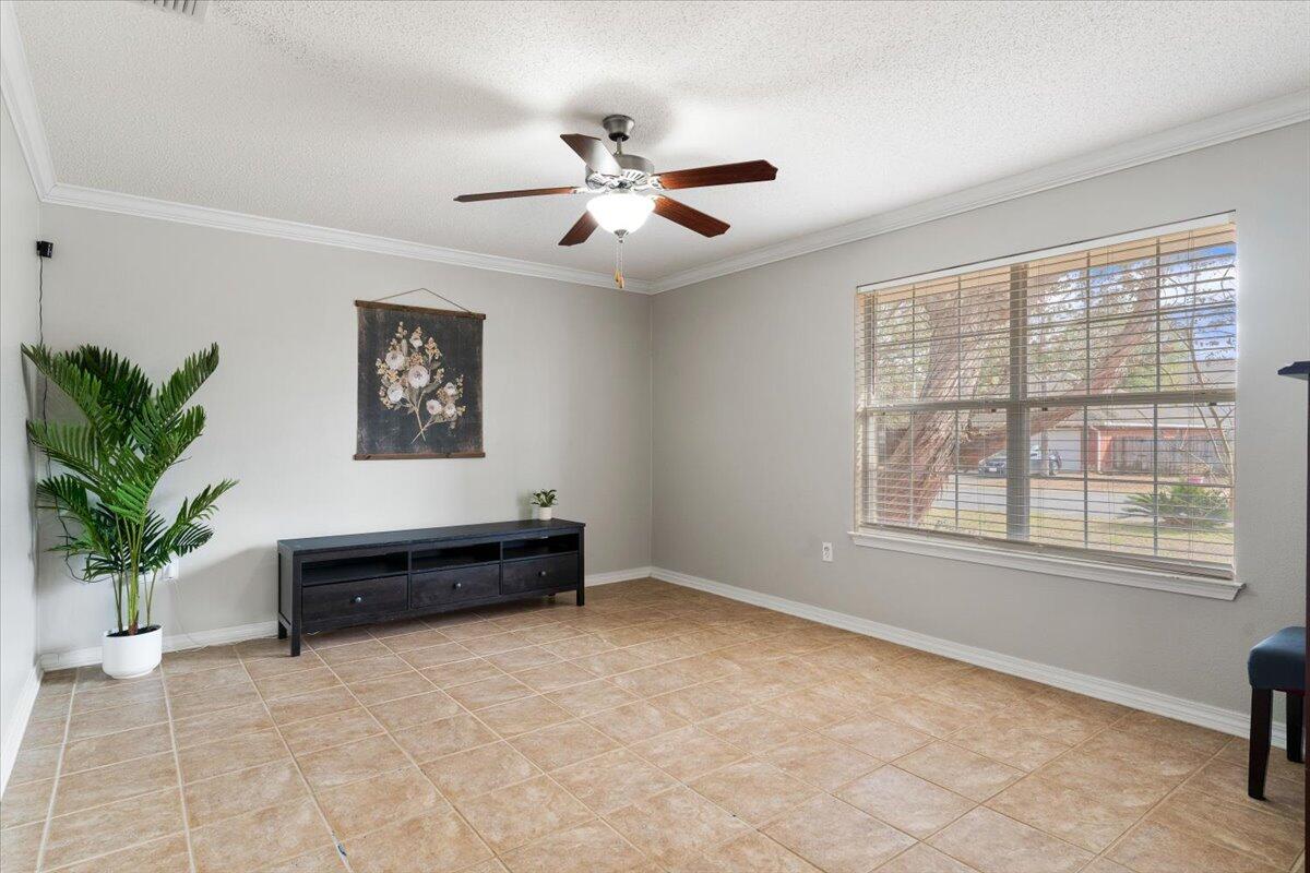 210 Citadel Lane Crestview, FL 32539 - Photo 7 of 38 a spacious bedroom with furniture and a window