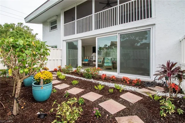 a view of a backyard with garden