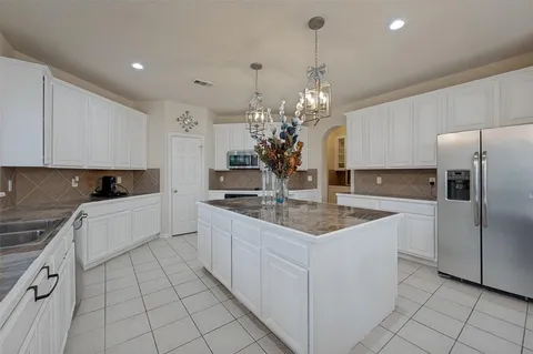 $585,000 | 9617 Peach Tree Lane, Rowlett, TX 75089