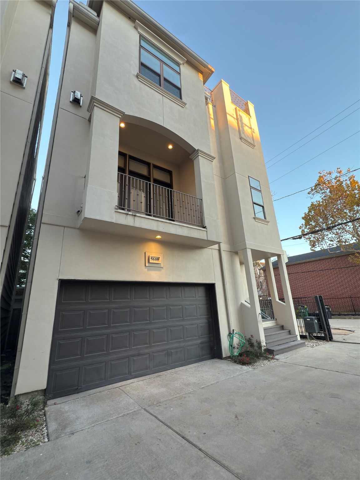 5640 Larkin Street Houston, TX 77007 - Photo 2 of 36 a front view of a house with garage