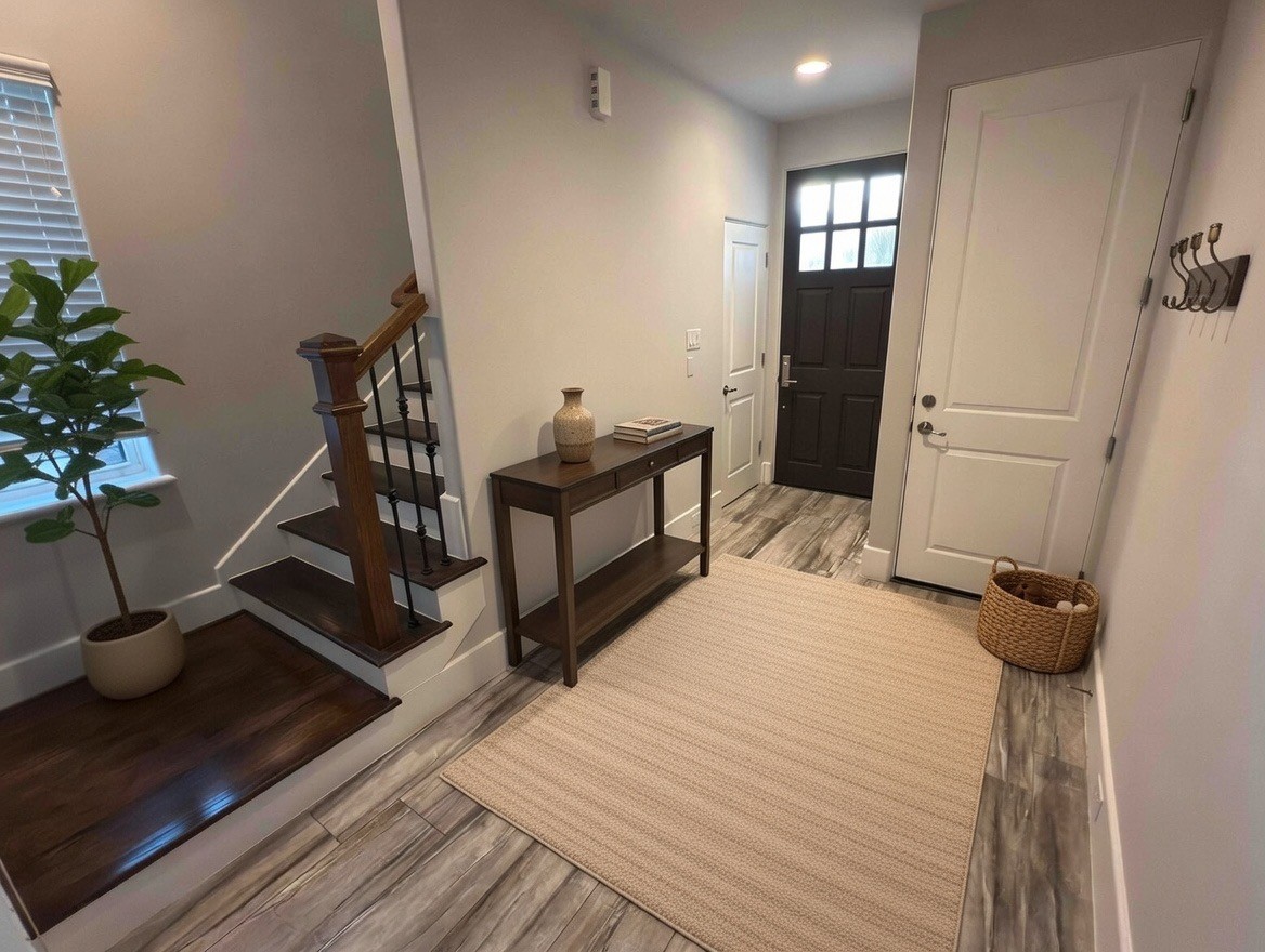 5640 Larkin Street Houston, TX 77007 - Photo 9 of 36 a bedroom with a bed and a potted plant