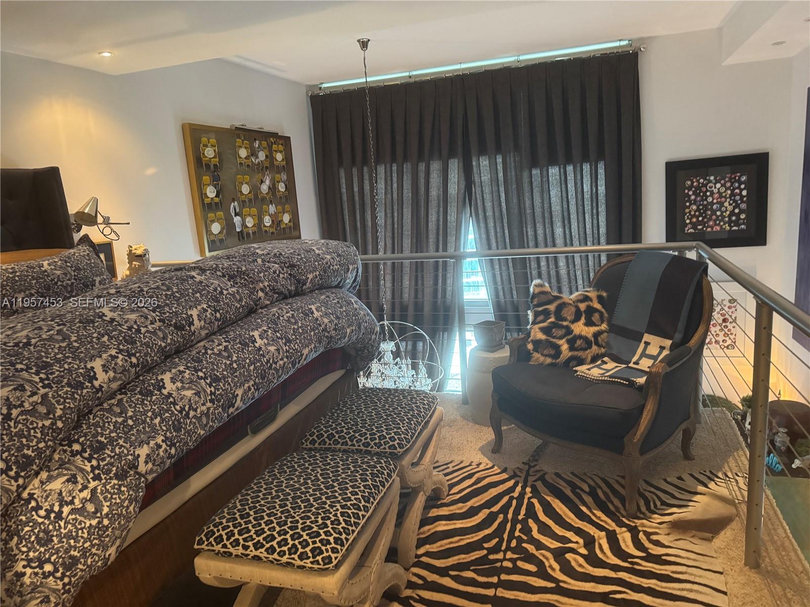 1050 Brickell Avenue, Unit 818 Miami, FL 33131 - Photo 14 of 19 a living room with furniture